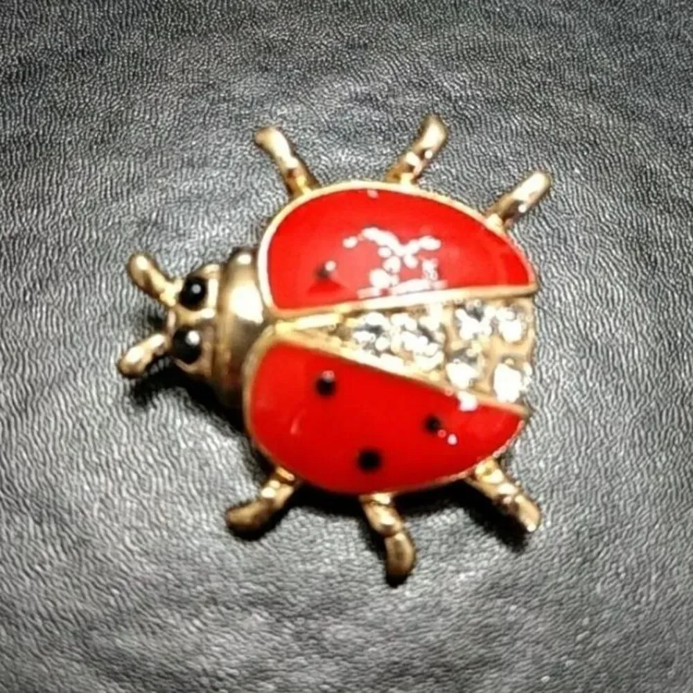 Gold tone and red enamel ladybug pin brooch